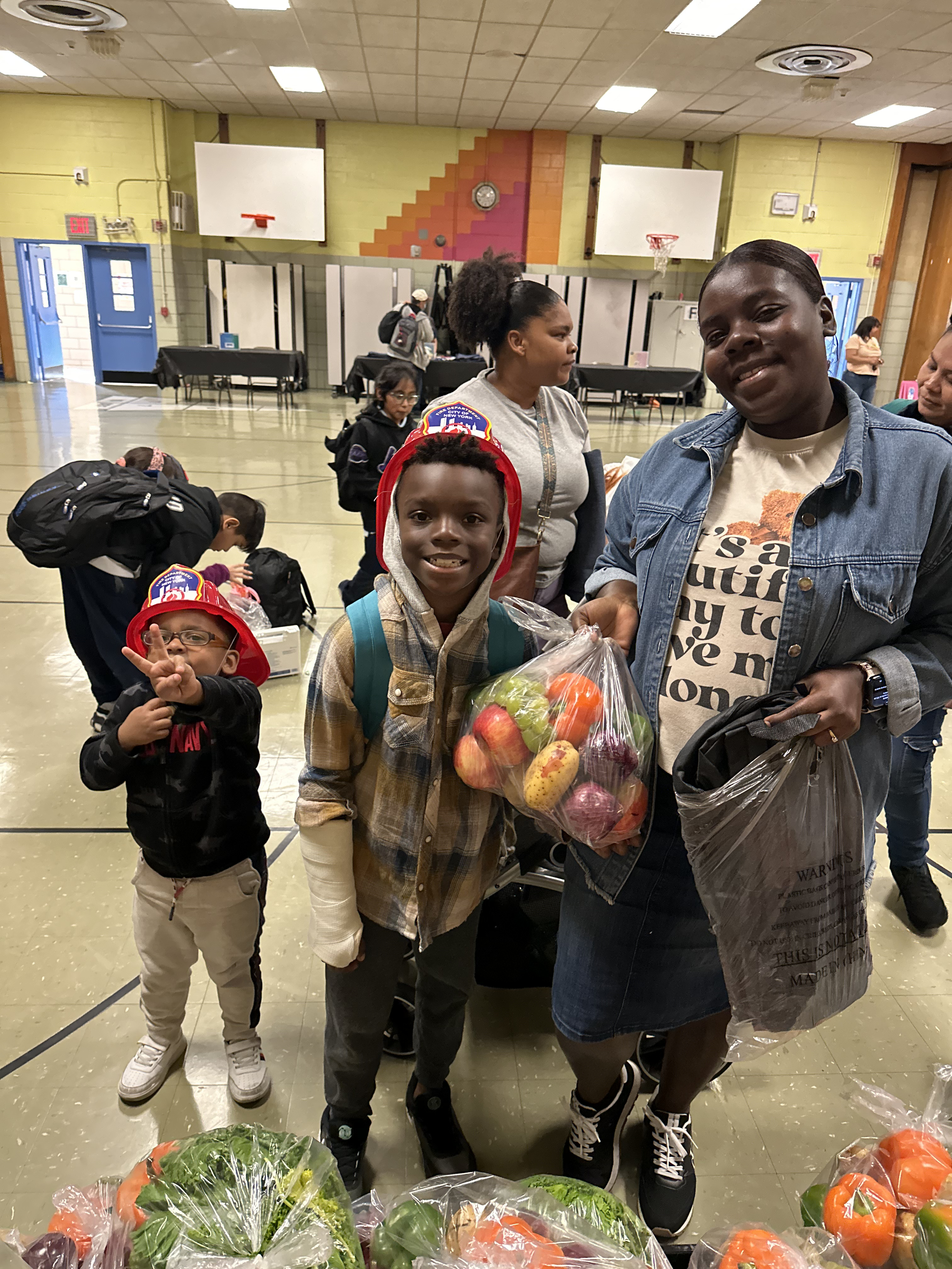 Family receiving fresh produce